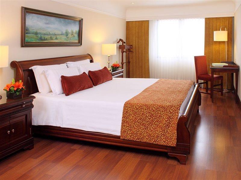 Hotel Estelar La Fontana Bogota Buitenkant foto A bedroom at the hotel